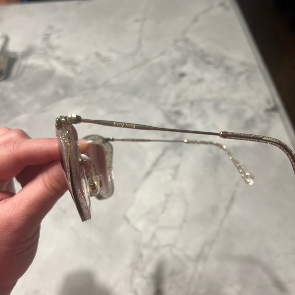 Miu Miu Gold Glitter Cat Eye Sunglasses with Mirrored Gold Lenses - Picture 5 of 6